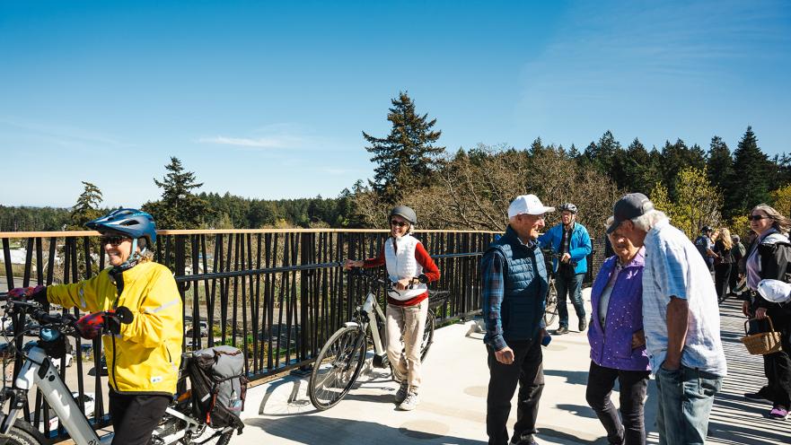 people enjoying colwood's galloping goose bridge