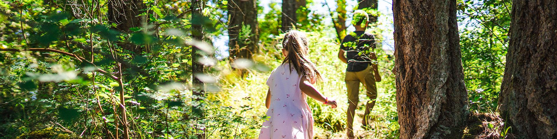 kids running trail forest greenery