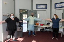 flu clinic staff masked and distanced