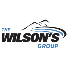 The Wilson's Group logo with a mountain silhouette and curved lines.