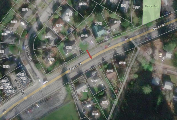 An aerial map view showing a section of Sooke Road in Colwood, with a highlighted red line indicating a specific point of interest near Peace Park and surrounding residential properties.