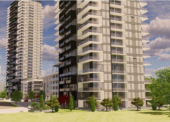 Modern high-rise apartment buildings with balconies and green space.