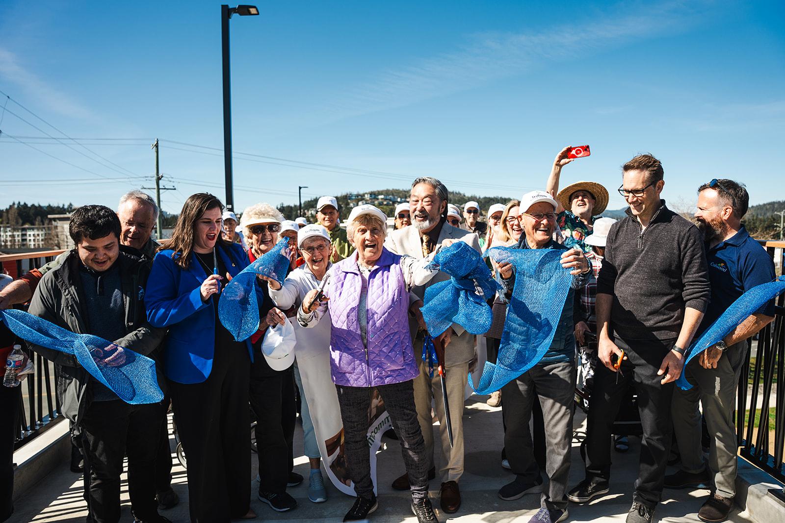 cutting the ribbon on the new galloping goose bridge